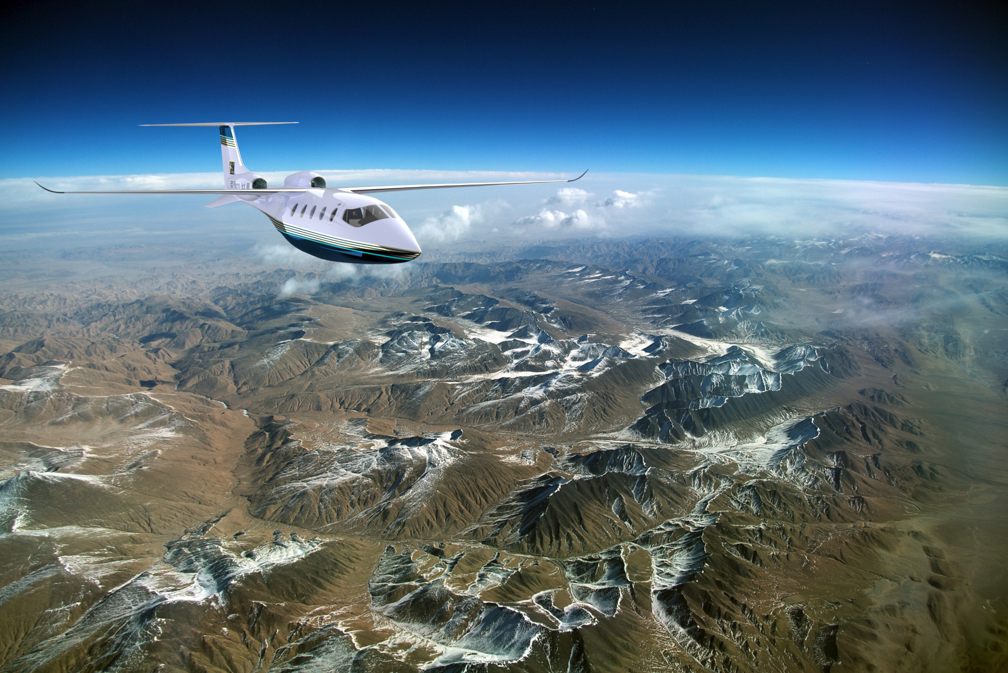 Piero Jet III flying at high altitude above mountains